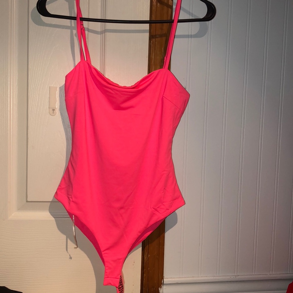 Pink princess Polly body suit